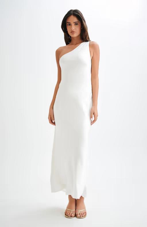 A woman wearing Meshki one shoulder satin maxi dress - white