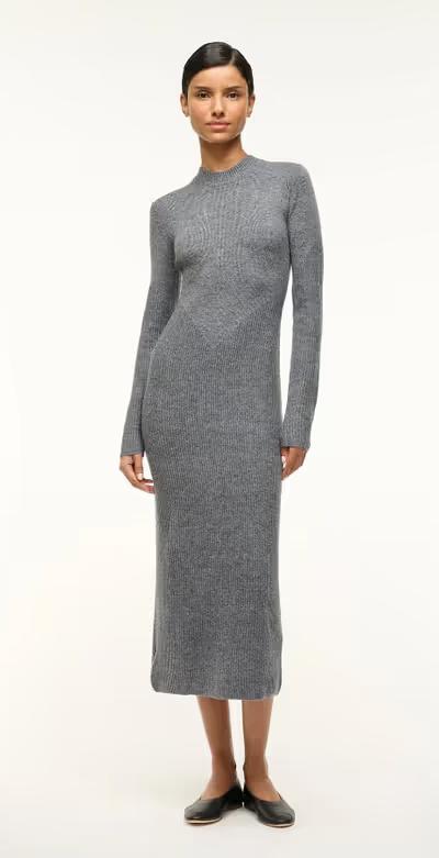 A woman wearing STAUD ramona dress charcoal grey