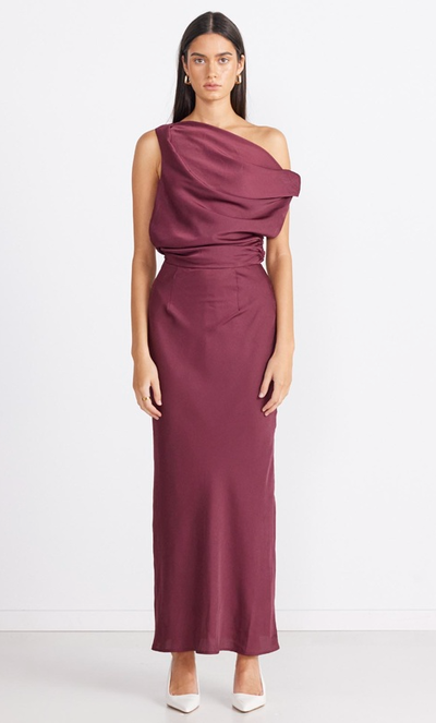 A woman wearing The Iconic burgundy calissa maxi dress