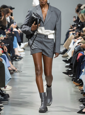 A woman wearing Peter Do grey combo classic blazer