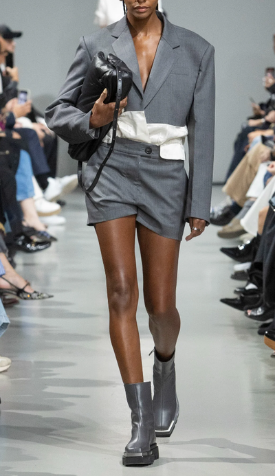 A woman wearing Peter Do grey combo classic blazer