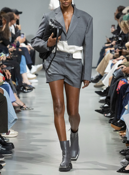 A woman wearing Peter Do grey combo classic blazer