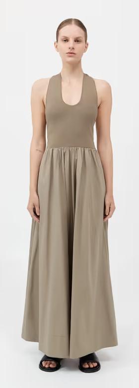 A woman wearing St. Agni plunge neck dress - shadow