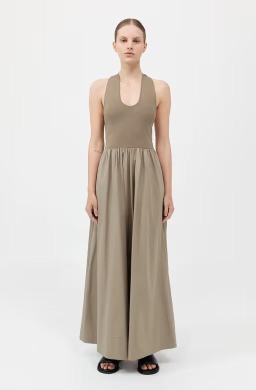 A woman wearing St. Agni plunge neck dress - shadow