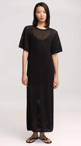 A woman wearing Argent black knit maxi dress in mercerized cotton