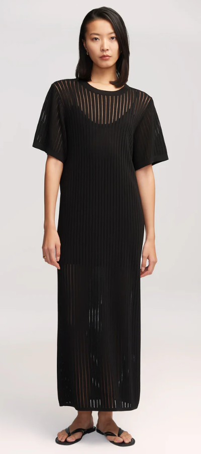 A woman wearing Argent black knit maxi dress in mercerized cotton