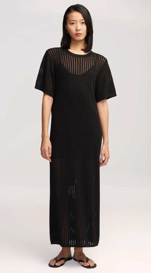 A woman wearing Argent black knit maxi dress in mercerized cotton