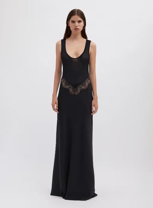 A woman wearing Christopher Esber black verna lace tank dress