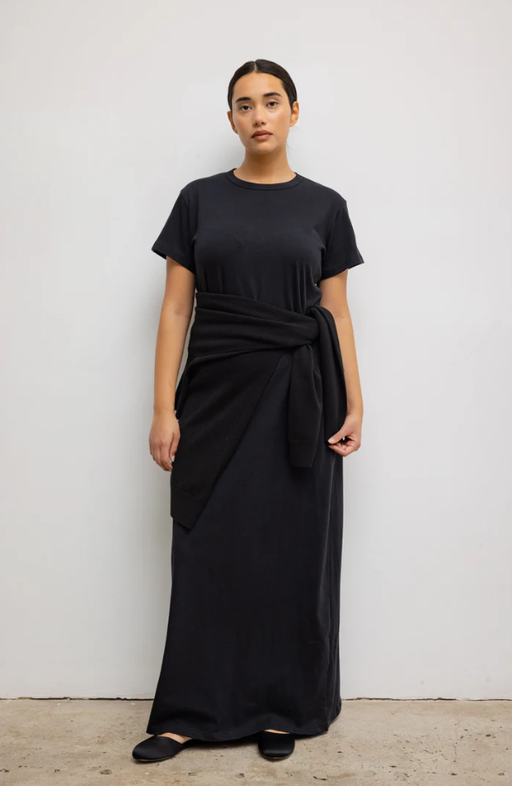 A woman wearing Leset black margo maxi dress