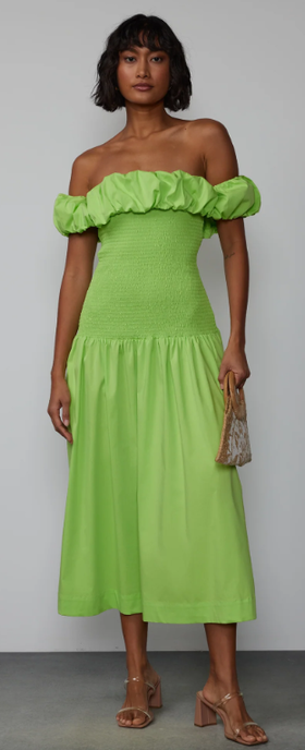 A woman wearing New York & Company off shoulder smock bodice midi dress