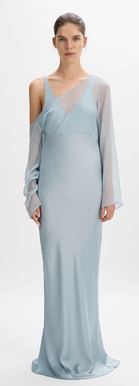 A woman wearing Beare Park bluebell color layered asymmetric dress