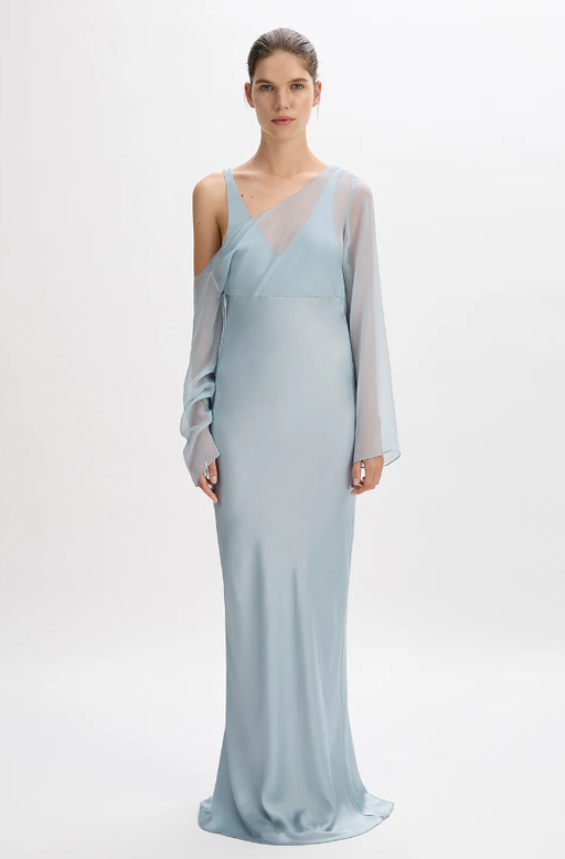 A woman wearing Beare Park bluebell color layered asymmetric dress