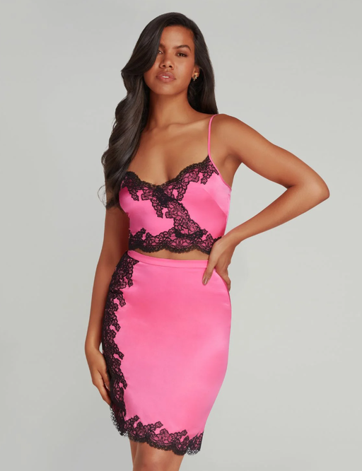 A woman wearing Agent Provocateur pink amelea skirt