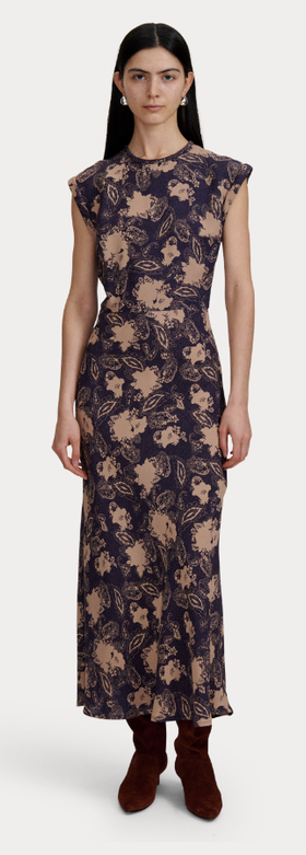 A woman wearing Rachel Comey black cero print adri dress