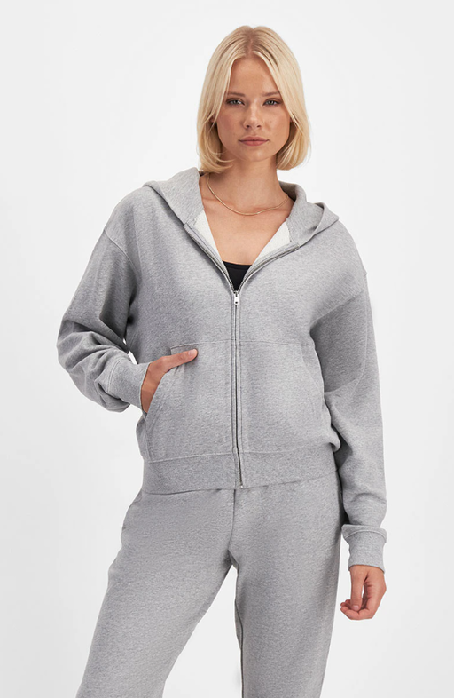 A woman wearing Bonds sweats cotton zip hoodie
