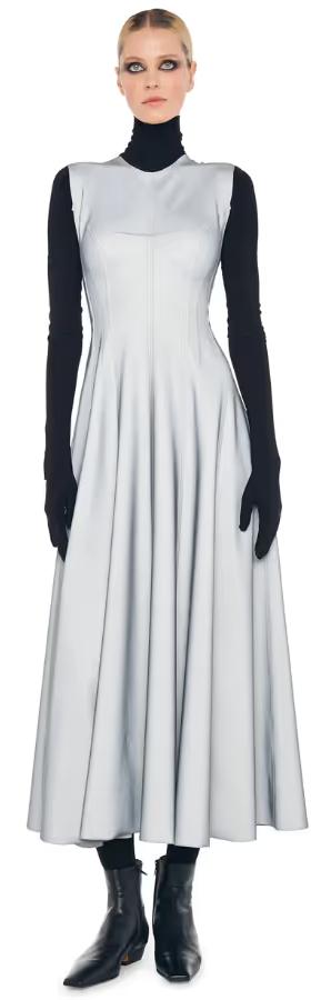 A woman wearing Norma Kamali grey sleeveless long grace dress
