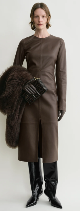 A woman wearing Toteme paneled leather dress bark