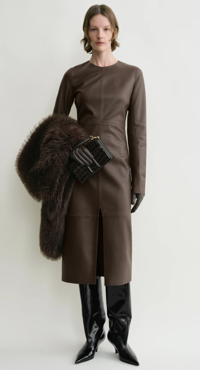A woman wearing Toteme paneled leather dress bark