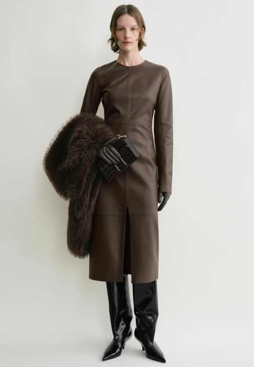 A woman wearing Toteme paneled leather dress bark