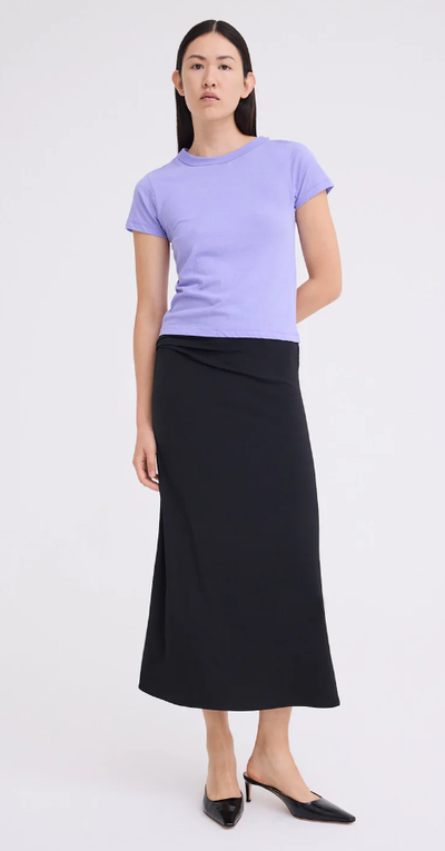 A woman wearing Jack+Jack periwinkle lilac color baby pima cotton tee