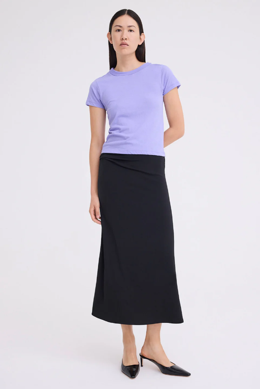 A woman wearing Jack+Jack periwinkle lilac color baby pima cotton tee