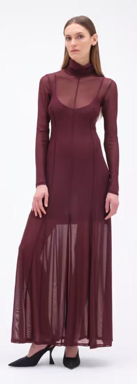 A woman wearing REMAIN BIRGER CHRISTENSEN winetasting color maxi mesh dress bordeaux