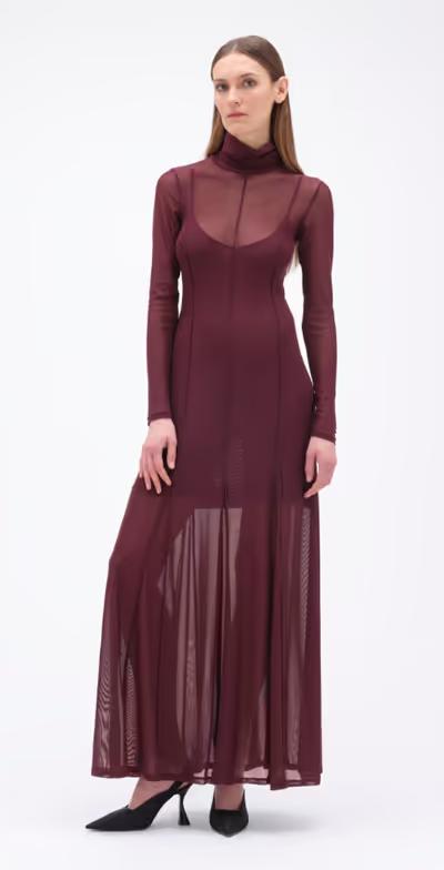A woman wearing REMAIN BIRGER CHRISTENSEN winetasting color maxi mesh dress bordeaux