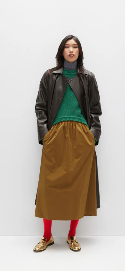 A woman wearing Tibi outfits from Tibi