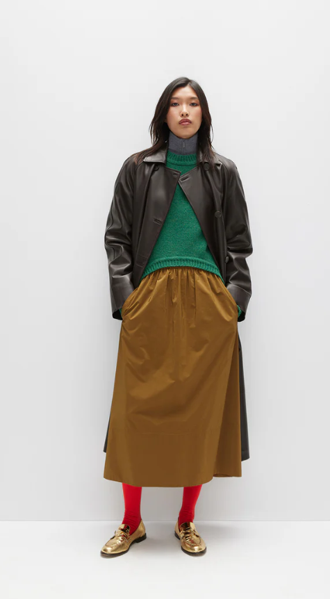 A woman wearing Tibi outfits from Tibi