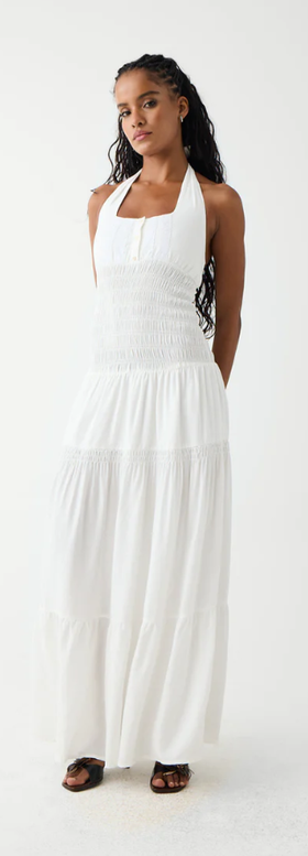 A woman wearing Frankies Bikinis white river halter maxi dress