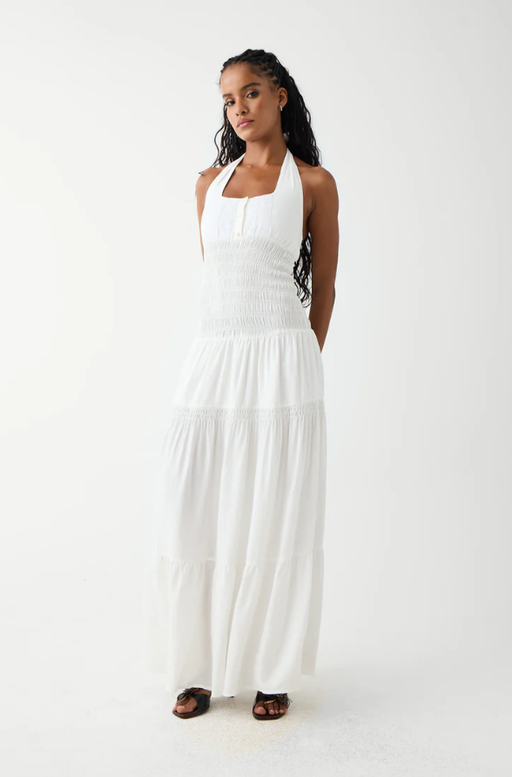 A woman wearing Frankies Bikinis white river halter maxi dress