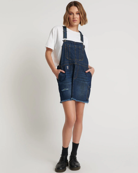 A woman wearing One Teaspoon royal blue mini stanton st dress