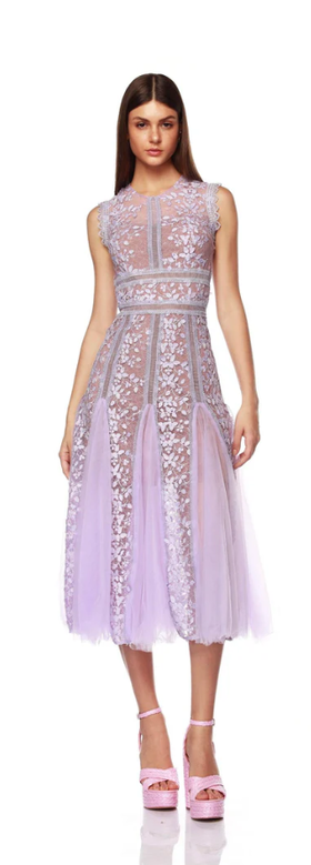 A woman wearing Bronx and Banco megan violet midi dress