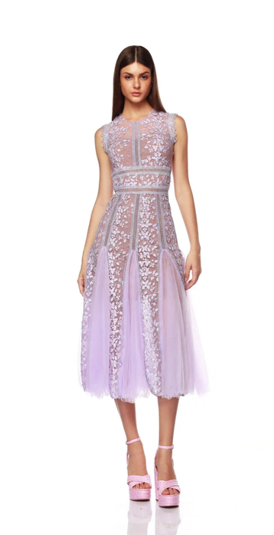 A woman wearing Bronx and Banco megan violet midi dress