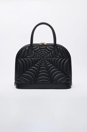 An image of Charlotte Olympia de winter handbag