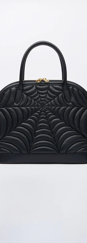 An image of Charlotte Olympia de winter handbag