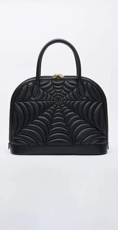 An image of Charlotte Olympia de winter handbag