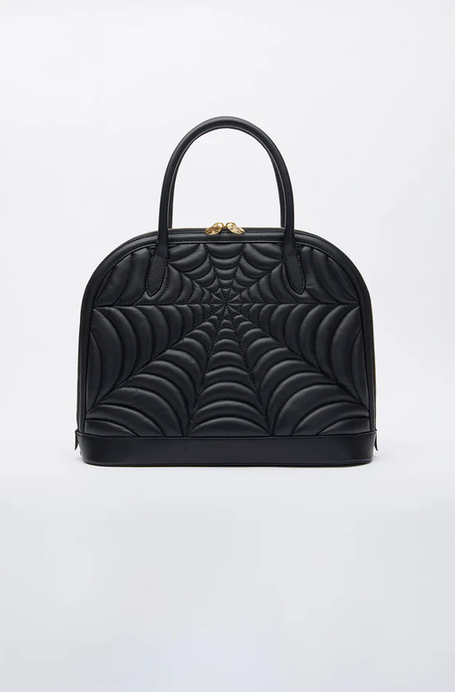 An image of Charlotte Olympia de winter handbag