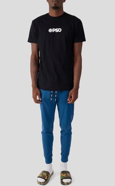 A man wearing PSD Underwear core logo tee - black