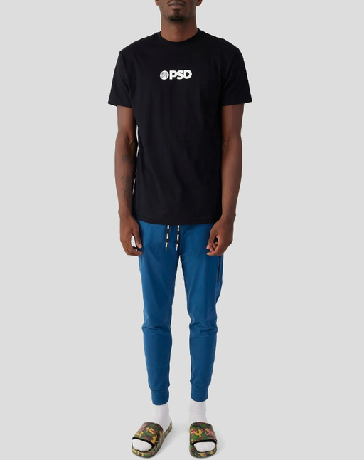 A man wearing PSD Underwear core logo tee - black