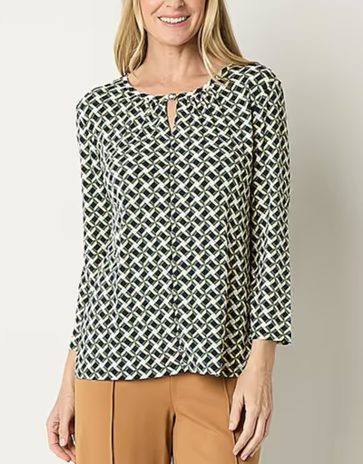 A woman wearing a Liz Claiborne shirt