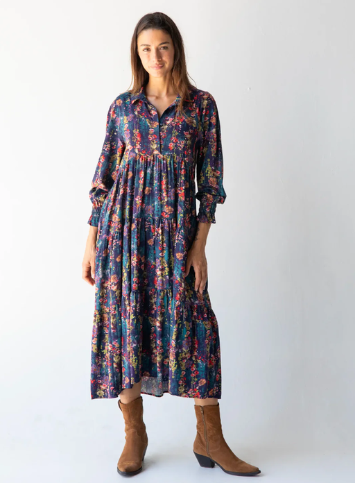 A woman wearing Natural Life​ rebecca long sleeve midi dress