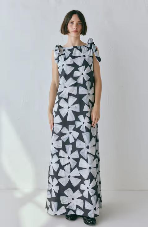 A woman wearing VRG GRL frances maxi dress fiore