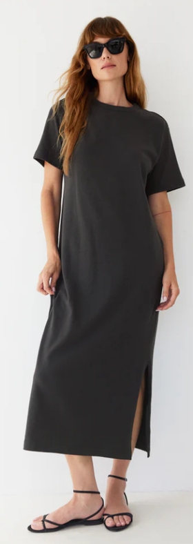 A woman wearing AYR the practice dress