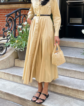 A woman wearing Dolce Vita lavern sandals