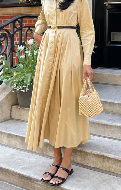 A woman wearing Dolce Vita lavern sandals
