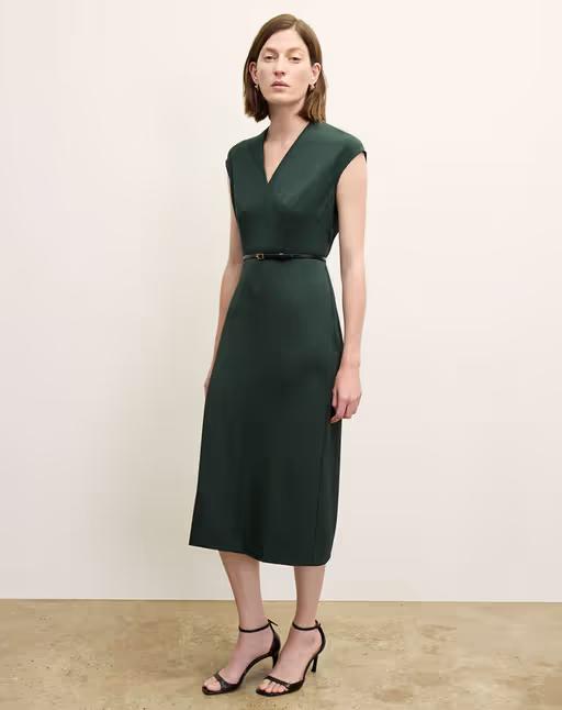 A woman wearing MM Lafleur​ the vienna dress - recycled wondertex