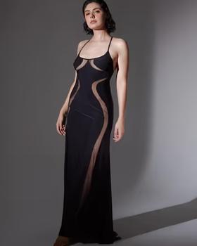 A woman wearing Thistle and Spire black psyche slip