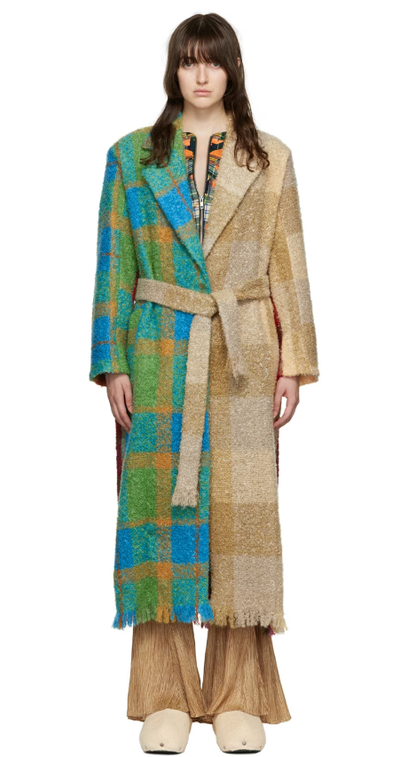 A woman wearing Rave Review multicolor lola fuzzy coat