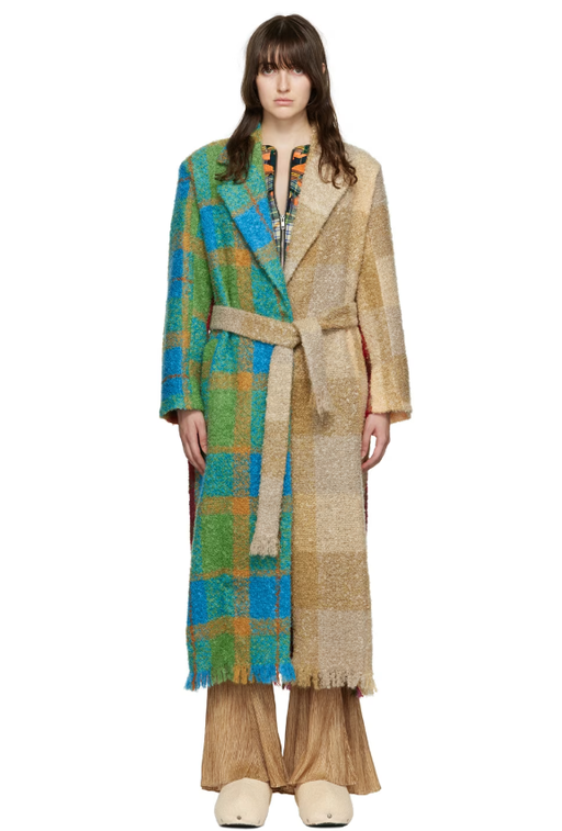 A woman wearing Rave Review multicolor lola fuzzy coat